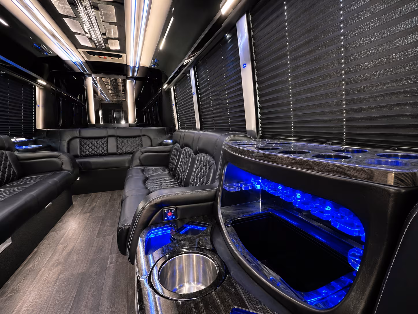 Group beside a Mercedes Sprinter limo in Baltimore